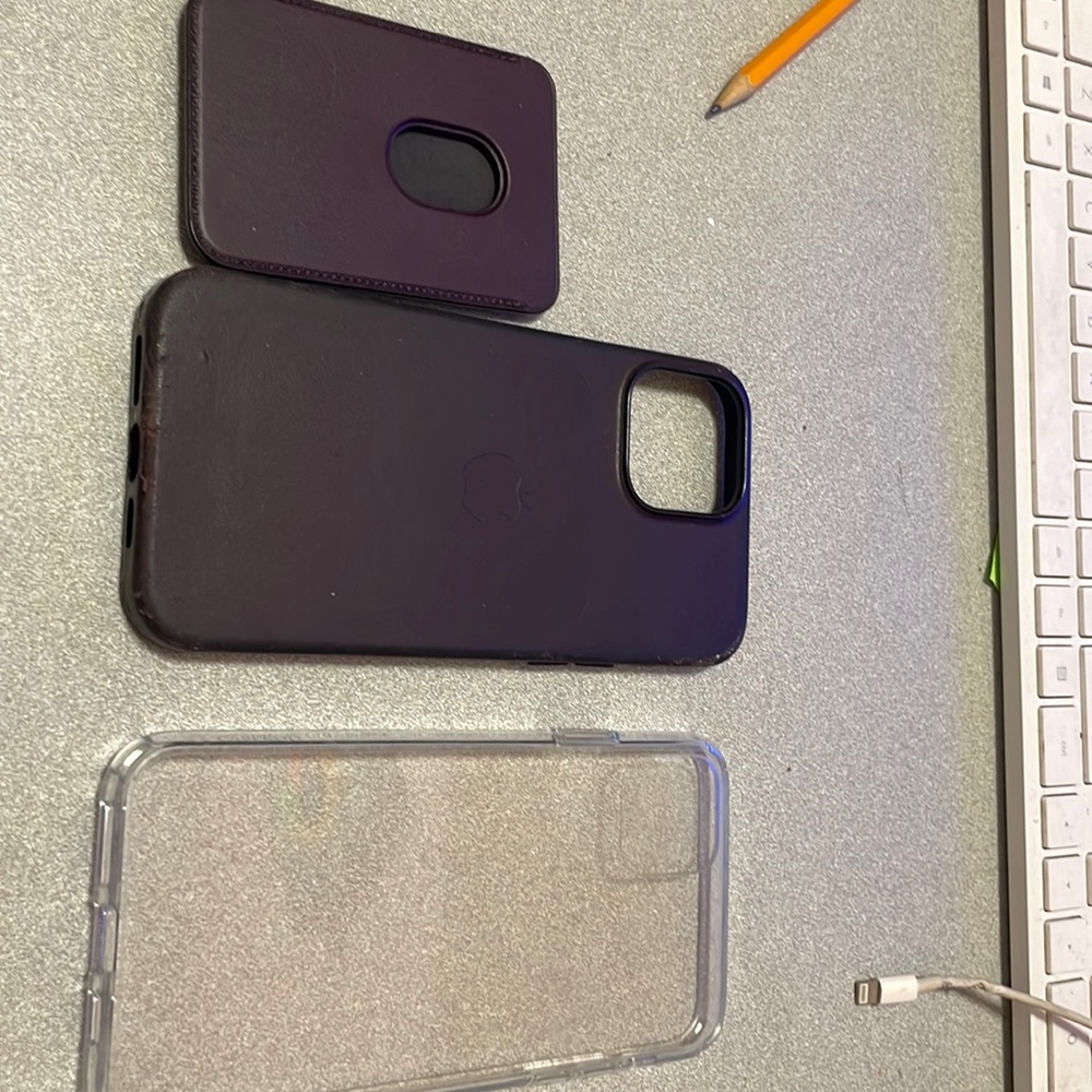 Apple phone case with magnet of credit card . 100’/. Lather plus one clear case